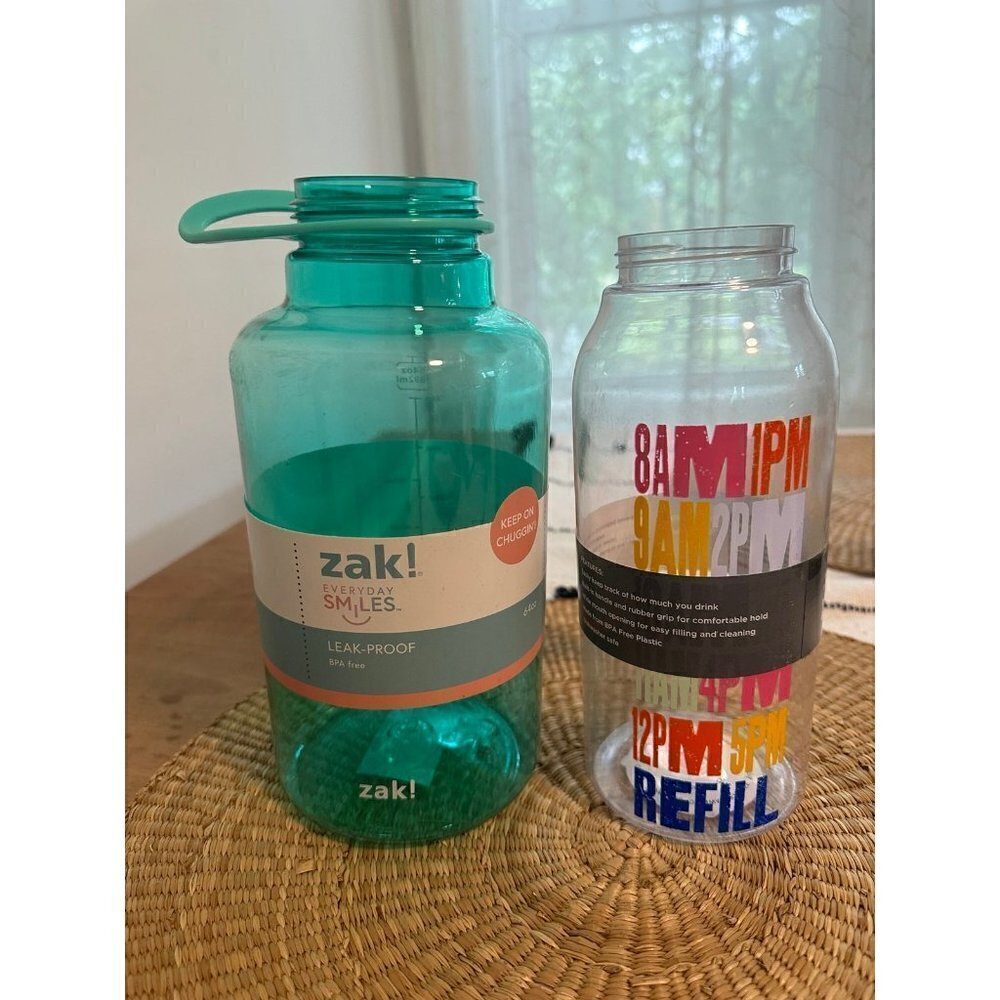 Two Large plastic water bottles *without caps